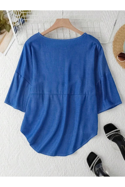 Blusa ampia con scollo a giro e maniche corte 